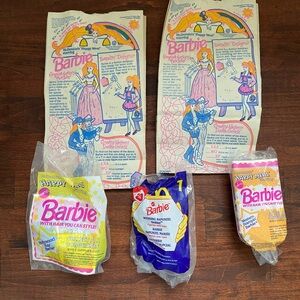 Collection of 1990s McDonald’s Barbie memorabilia including 3 sealed figurines